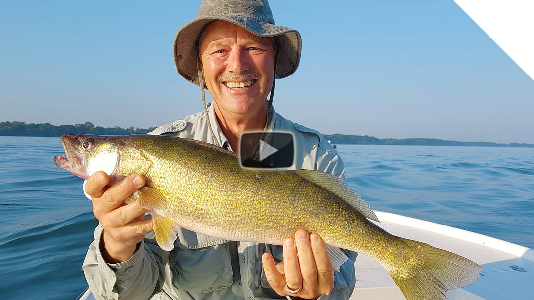 Deep water jigging for walleye along a break