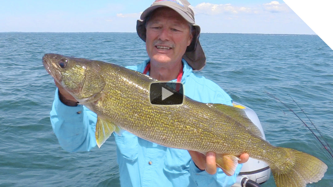 Jigging for walleye with the peanut bunker - "Feel the bite, enjoy the fight!!"